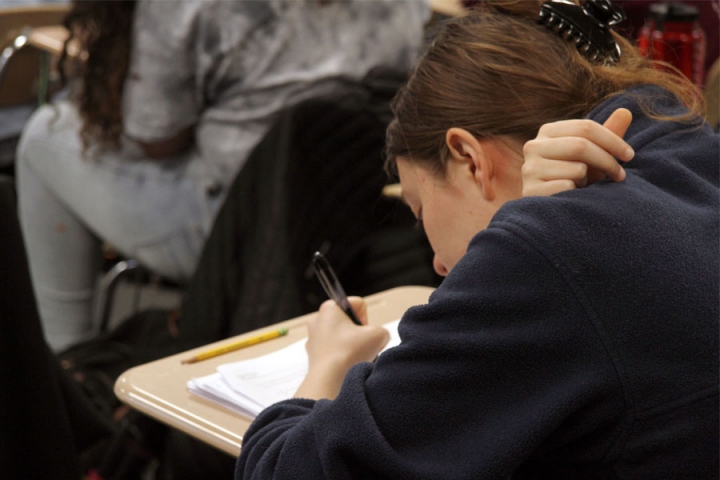 A student working on an assignment in class